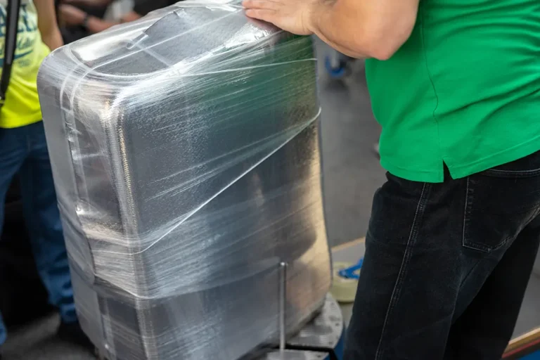 The Real Reason Why Some People Wrap Luggage in Plastic